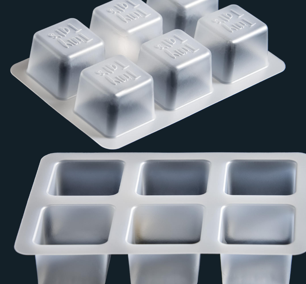 Molded pulp trays vs thermoformed plastic trays, second material